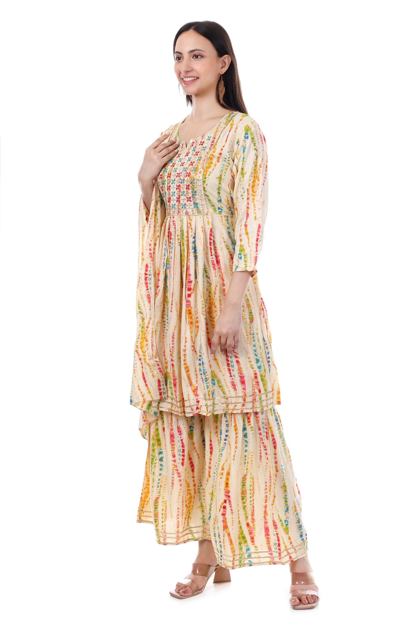 Yellowed embroidered sharara set. This set comes with a dupatta and kurta