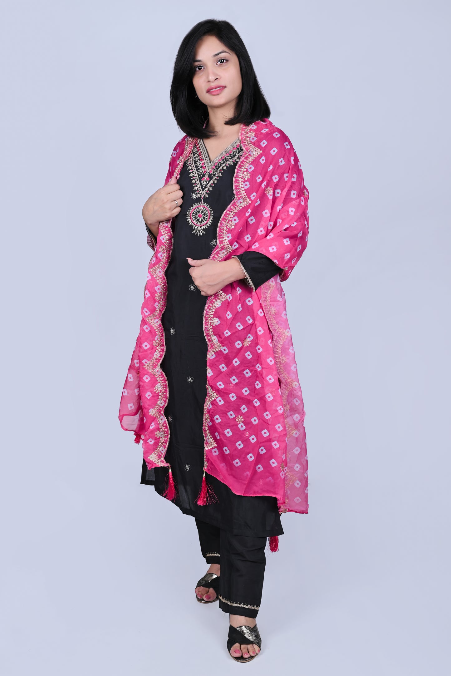 Black embroidered kurta set with pink dupatta