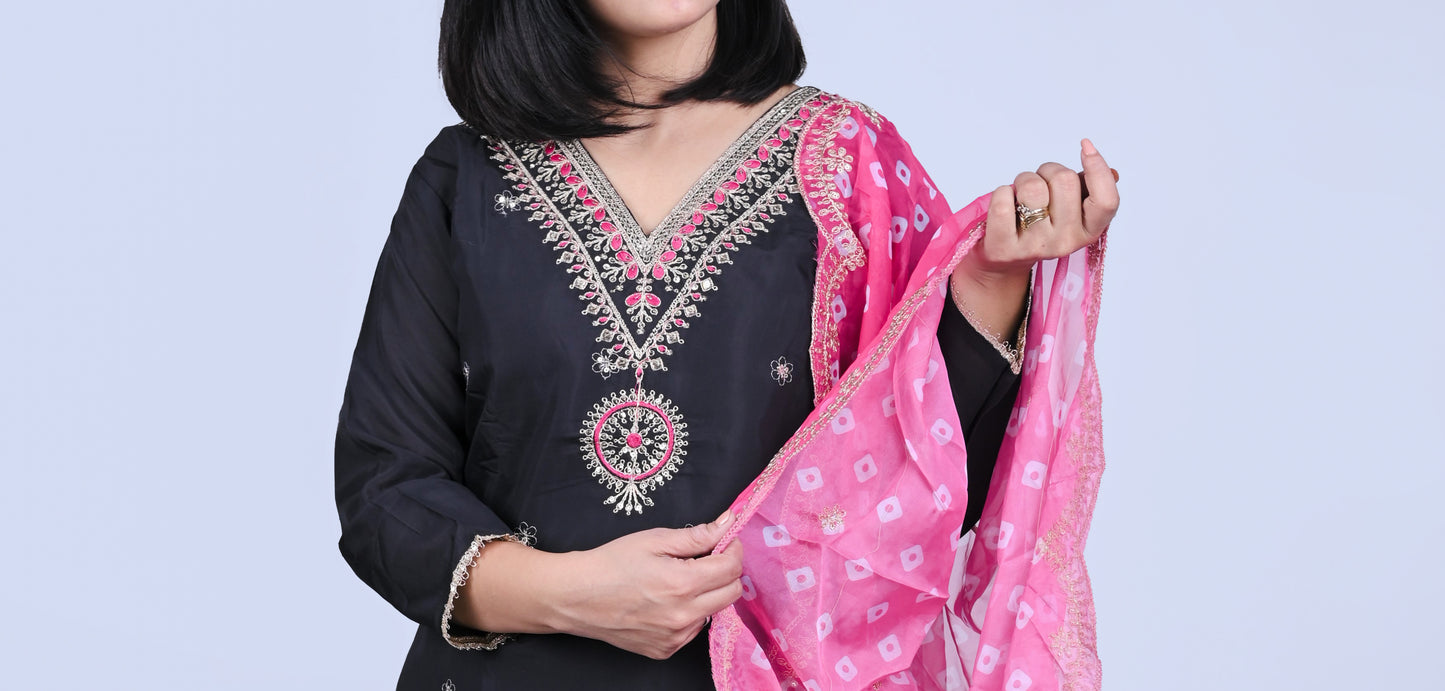Black embroidered kurta set with pink dupatta